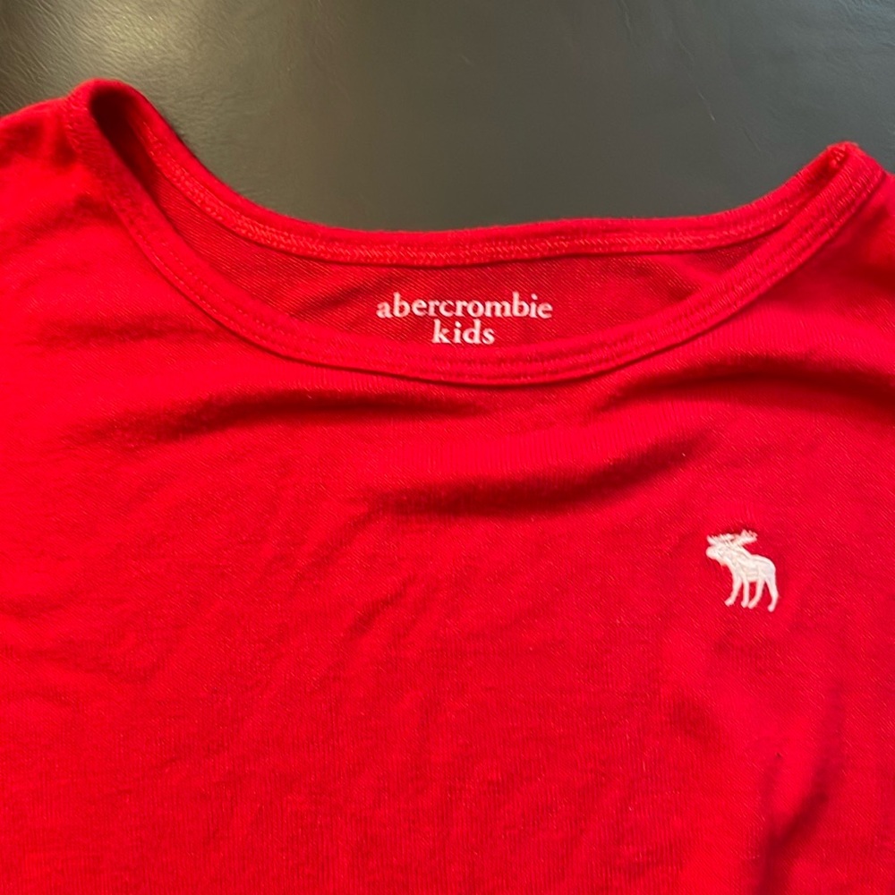 Abercrombie kids twist front long sleeved logo knit in red. Size 13/14.